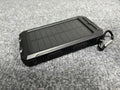 Portable power bank with a camping light